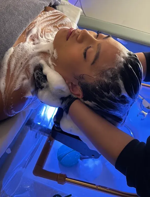 Milbon shampoo worked into a lather at the start of a head spa in Everett, WA